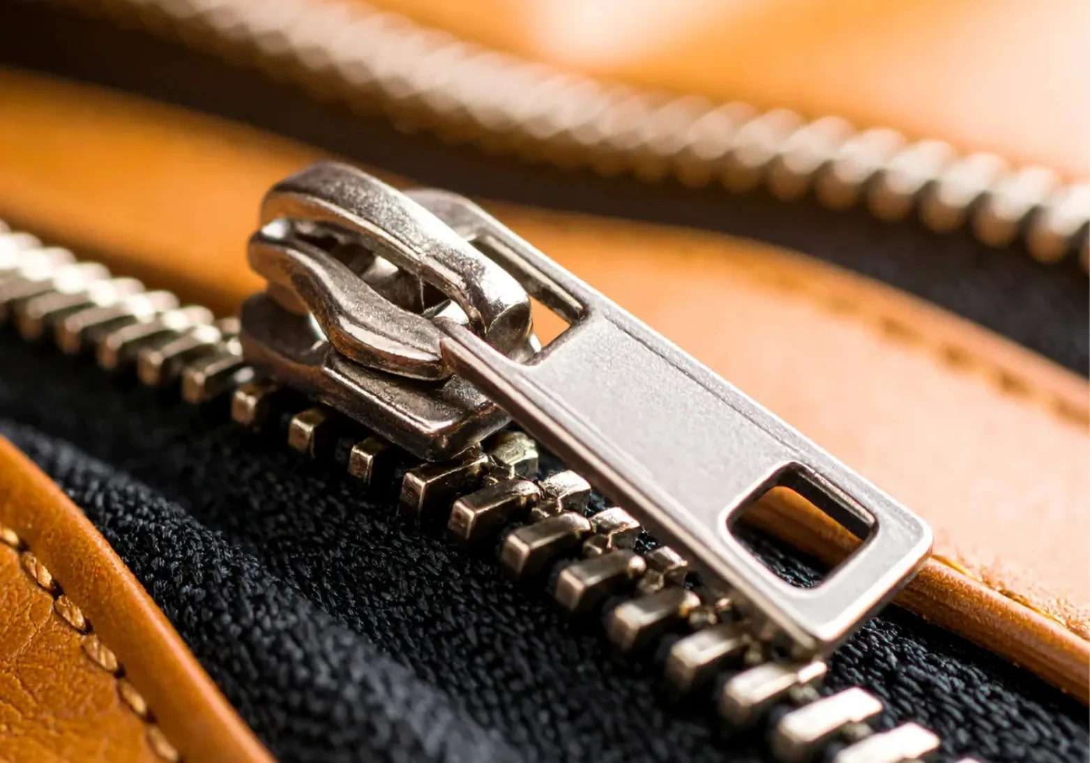 Types of Zipper Sliders: Complete Guide for Manufacturers & Bulk Buyers